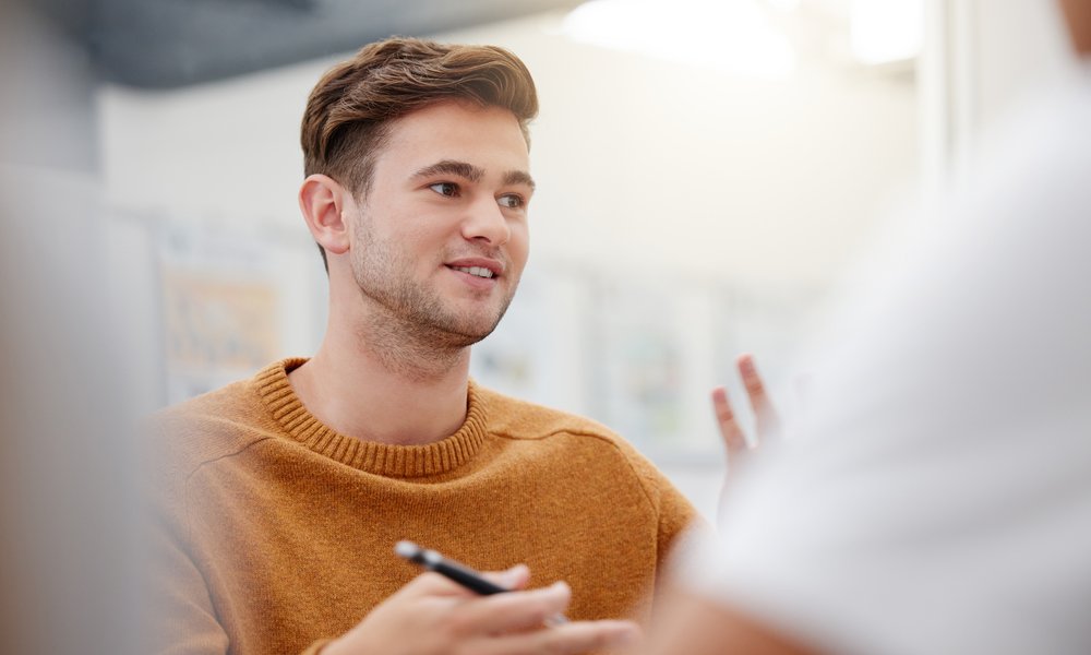 Man mentoring in a workshop